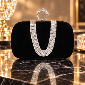 Black velvet clutch with crystal ring handle