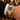 Gold pave crystal square watch worn on the wrist